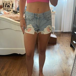 Express shorts with flower detailing on pockets
